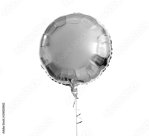holidays, birthday party and decoration concept - one metallic silver inflated helium balloon over white background photo