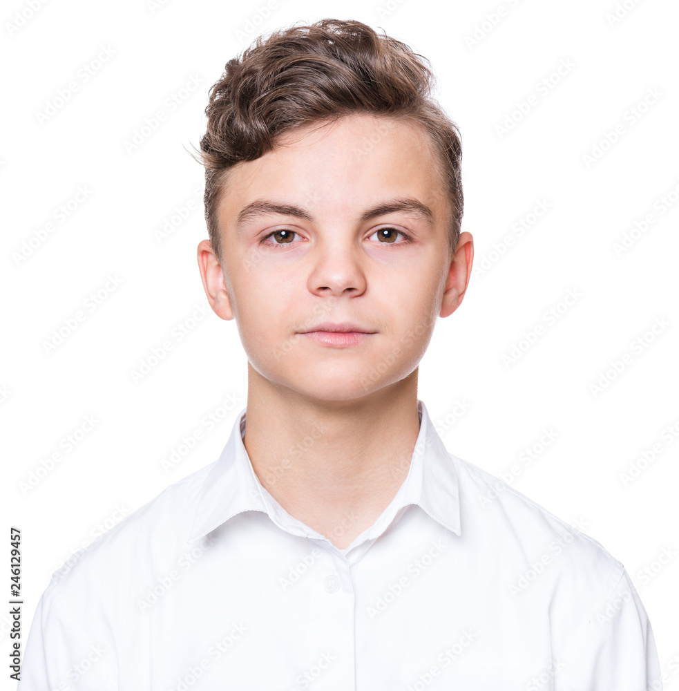 Handsome caucasian Teen Boy isolated on white background. Teenager looking at camera. Happy child - close-up portrait. Handsome caucasian Teen Boy isolated on white background. Teenager looking at camera. Happy child - close-up portrait.
