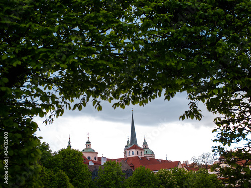 Prague church view with green trees