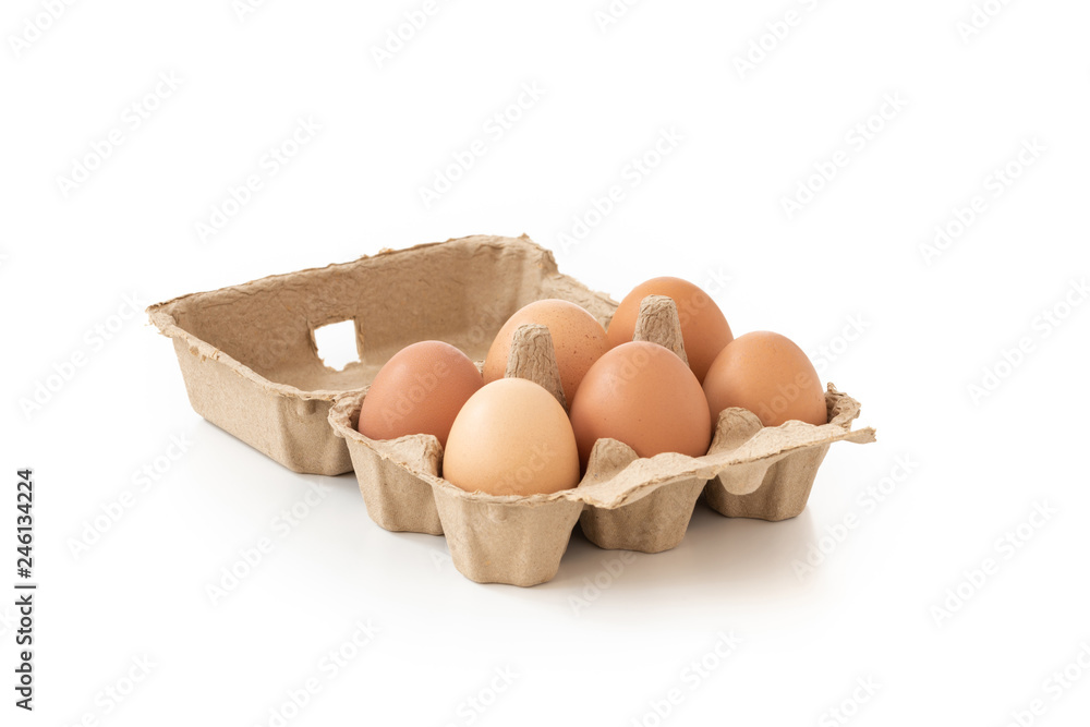 Fresh brown eggs in carton on isolated

