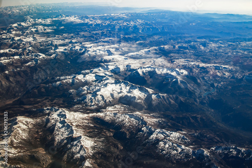 California mountains covered with Snow aerial View from airplane, California, USA
