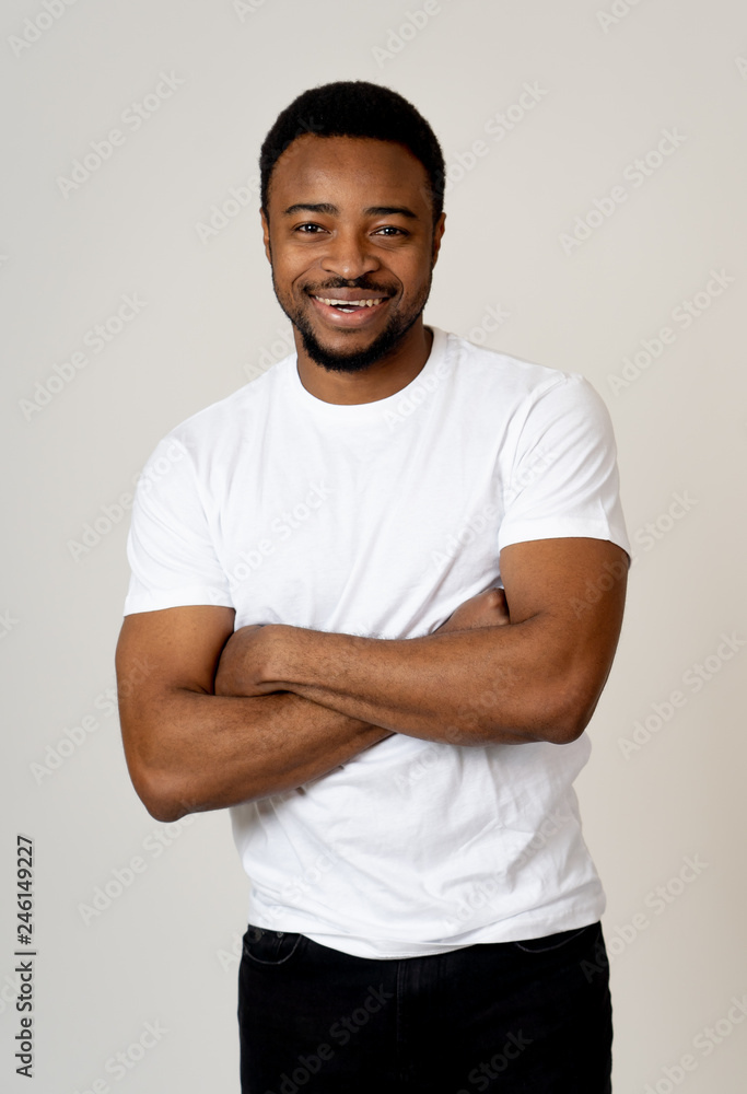 Human expressions and emotions. Portrait of young handsome man with happy face, smiling Human expressions and emotions. Portrait of young handsome man with happy face, smiling