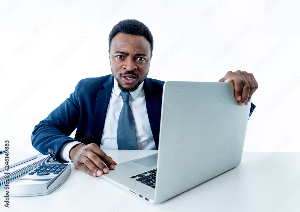 Portrait of angry and frustrated businessman shouting at laptop desperate, overworked and stressed Portrait of angry and frustrated businessman shouting at laptop desperate, overworked and stressed