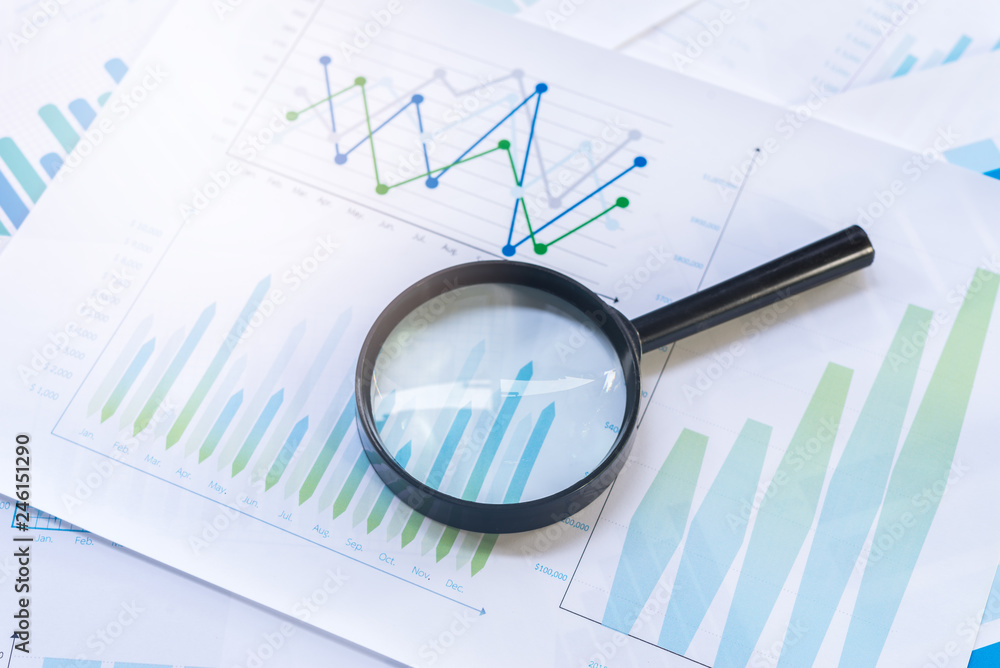 Magnifying with Business Graphs finance document. Magnifying with Business Graphs finance document.