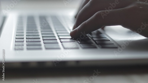 close up. businessman typing on laptop keyboard