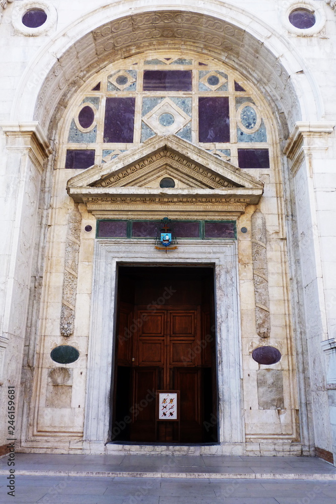 Entrance door of Tempio Malatestiano, cathedral of Rimini, Emilia Romagna, Italy