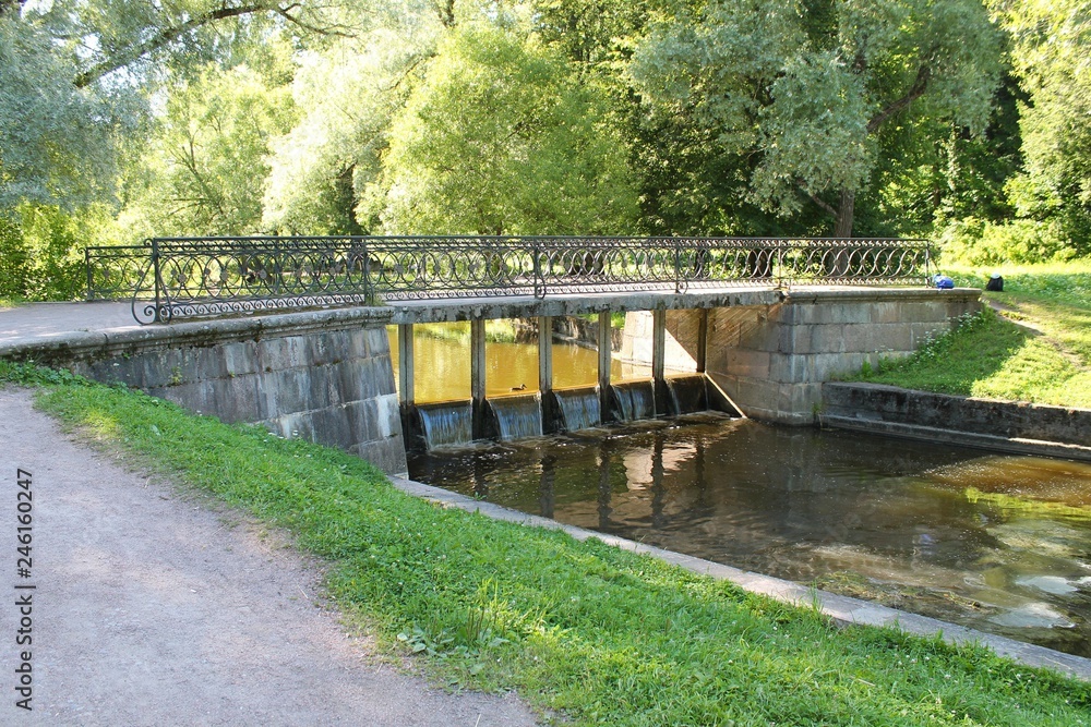 Black Bridge or Dam Bridge. Pavlovsky Park. The city of Pavlovsk.