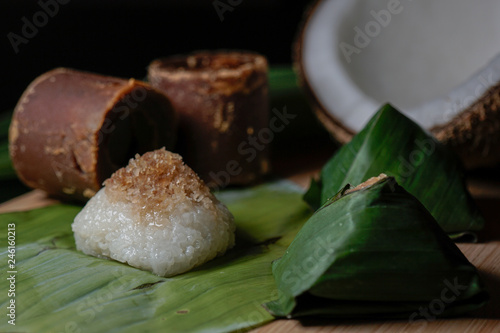 Pulut Inti. Savory glutinous rice with sweetened grated coconut wrapped in banana leaf. 