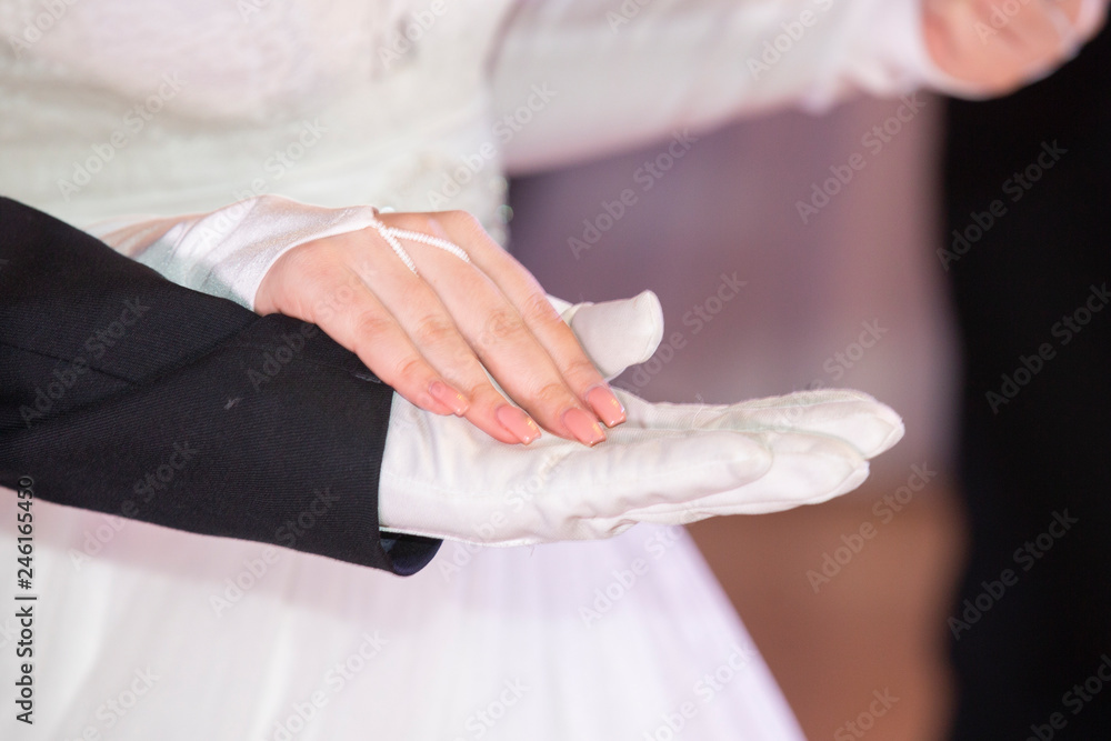 Wedding theme, holding hands newlyweds White gloves Wedding theme, holding hands newlyweds White gloves