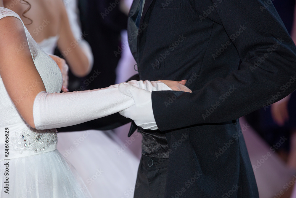 Wedding theme, holding hands newlyweds White gloves
