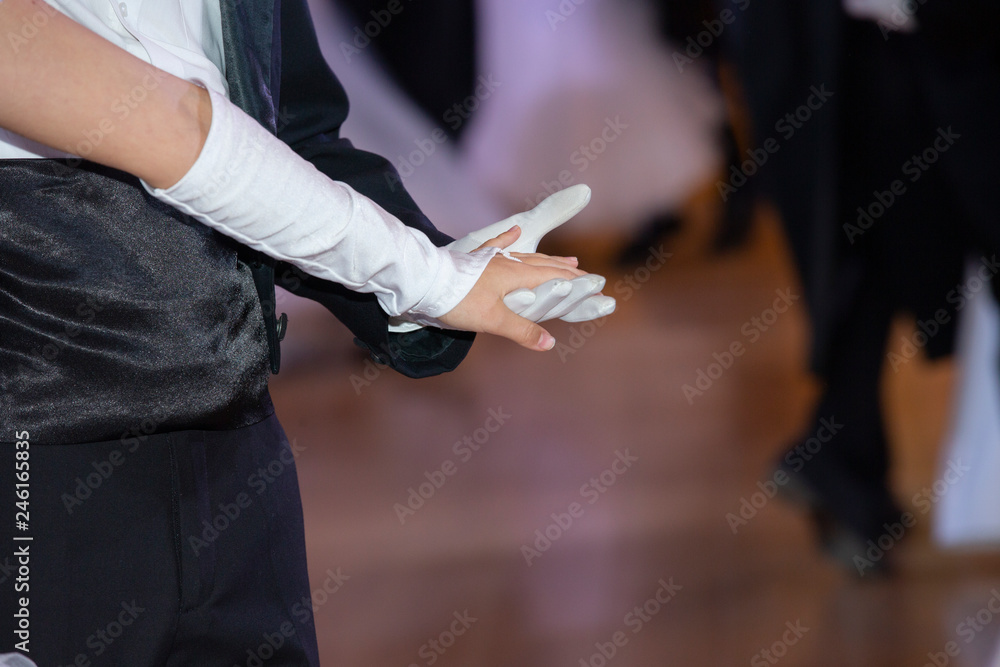 Fototapeta premium Wedding theme, holding hands newlyweds White gloves