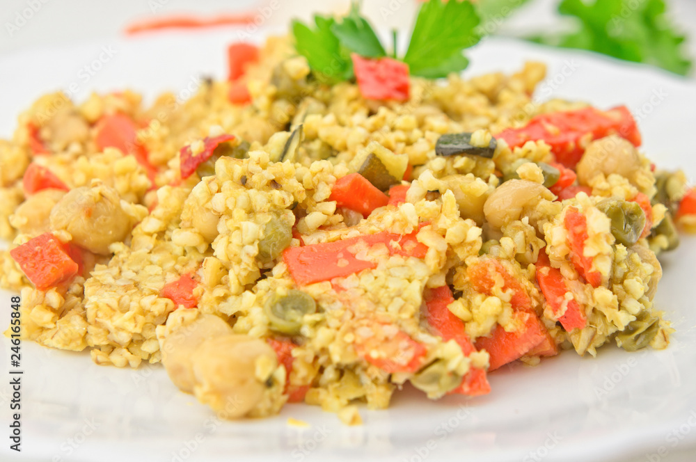 Cooked cous cous with vegetables closeup Cooked cous cous with vegetables closeup