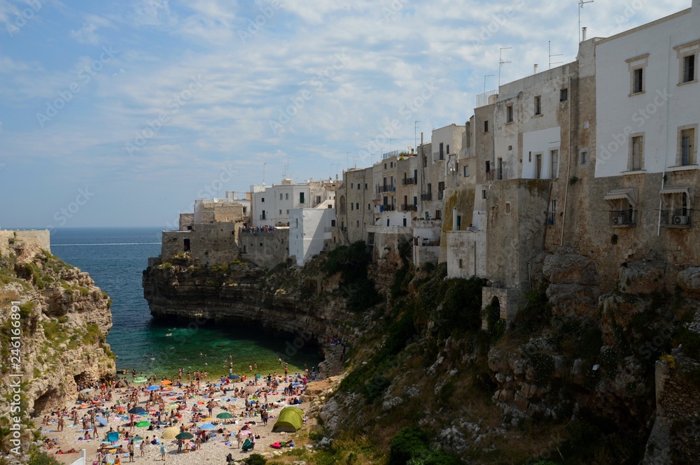 The tourist town of Polignano in Italy with its beautiful bay