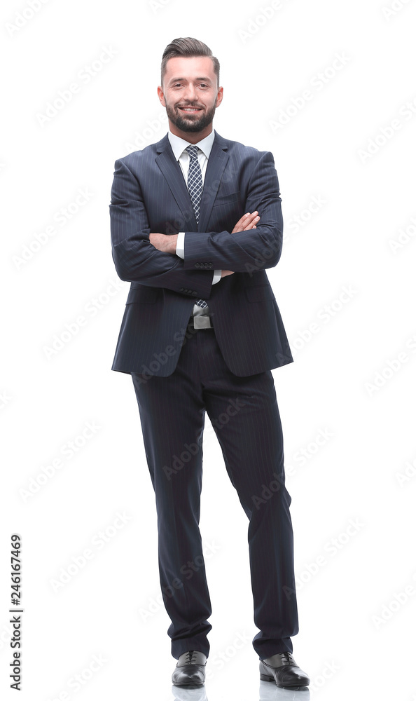 in full growth. businessman arms folded in full growth. businessman arms folded