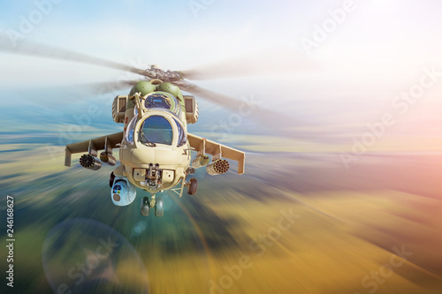 Military combat helicopter flies at high speed, territory patrol guards.