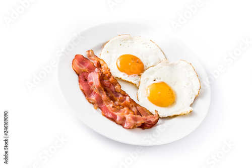 Fried eggs and bacon for breakfast isolated on white background. 