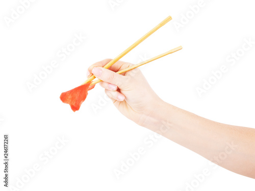 chopsticks in hand on a white background
