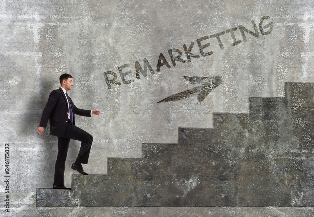 Business, technology, internet and networking concept. A young entrepreneur goes up the career ladder: Remarketing Business, technology, internet and networking concept. A young entrepreneur goes up the career ladder: Remarketing
