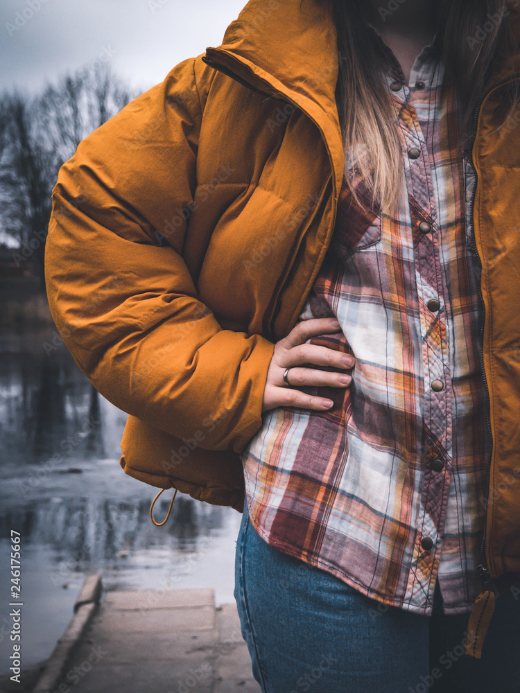 woman in yellow jacket woman in yellow jacket