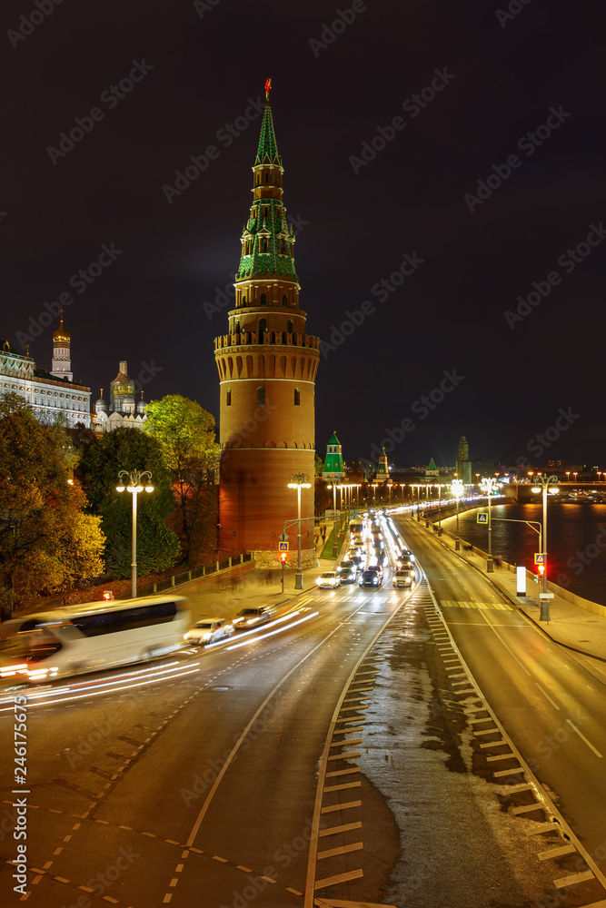 Tower of Moscow Kremlin and Kremlevskaya embankment at night. Urban landscape