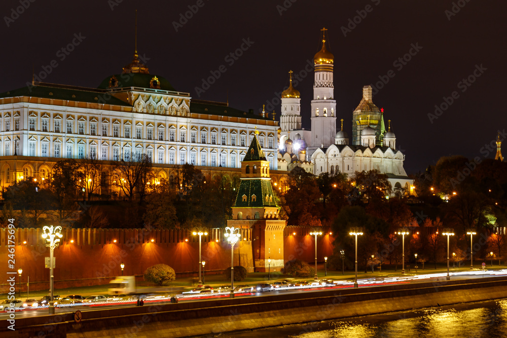 Grand Kremlin Palace and Cathedral of the Archangel on a background of Kremlevskaya embankment at night