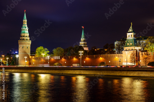 View of Moskva river on a background of Moscow Kremlin towers with night illumination