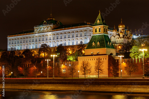 Grand Kremlin Palace on a background of wall and tower of Moscow Kremlin with night illumination