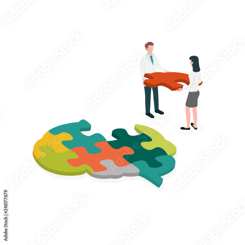 Occupational therapist (or medical professional) assembling a brain jigsaw puzzle. Concept picture for cognitive rehabilitation in Alzheimer disease and dementia patient.