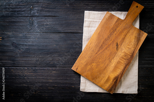 empty cutting wooden board with kitchen cloth