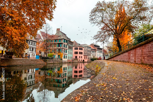 Traditional houses of Alsace over the river in the fall, Strasbourg, France