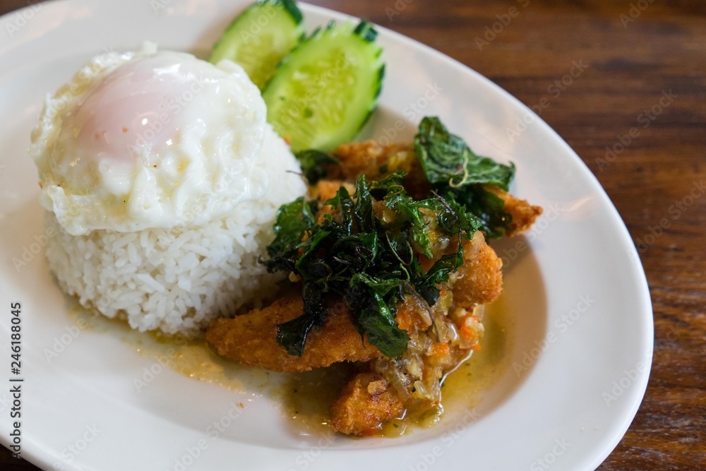 Spicy fried with basil leaves rice and Fried egg Spicy fried with basil leaves rice and Fried egg