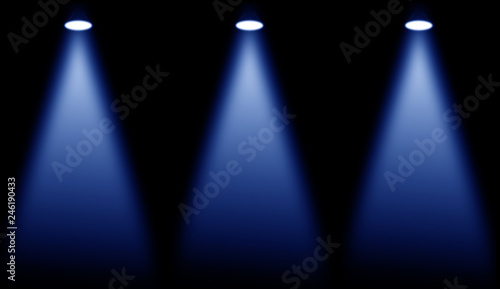 Blue stage . Spotlights on isolated black background.