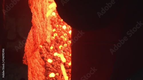 Iron pellets burn in a blast furnace