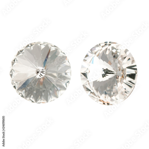 Large round white crystal rhinestones. Front and side view. Isolated on white.