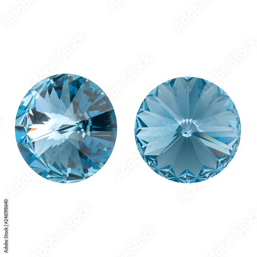 Large round turquoise crystal rhinestones. Front and side view. Isolated on white.