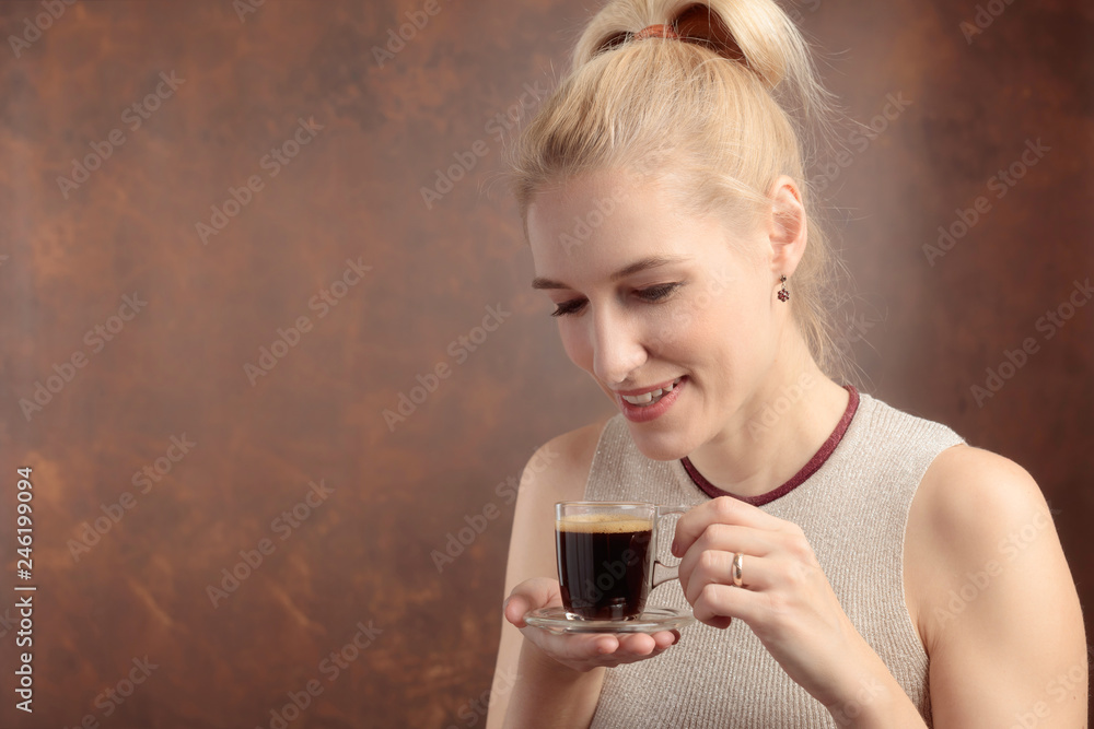 Portrait of a beautiful mid age woman with cup of coffee. Portrait of a beautiful mid age woman with cup of coffee.