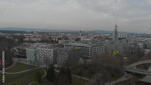 Drone shot over looking the city of Sankt P√∂lten, in Austria. The drone is up to discover the city. photo