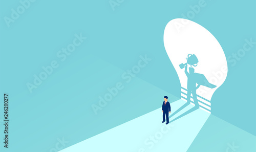 Vector of a businessman with superhero shadow holding a trophy. photo