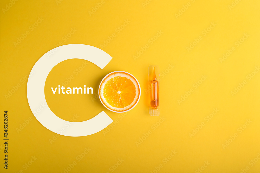 Immunity protection concept, antiviral prevention Serum and cosmetics with vitamin C.  Essential oil from citrus fruits. - obrazy, fototapety, plakaty 
