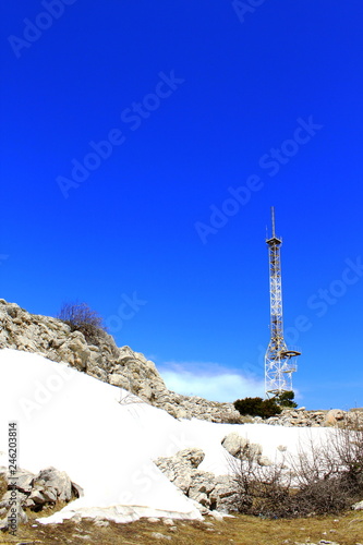 TV tower in the mountains against the blue sky © Dmitriy Bur