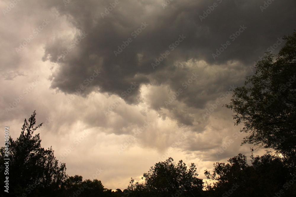 Dark dramatic thunder clouds building up to a hailstorm in summer.