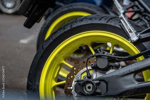 Closeup detail of motorcycle rear wheels and brake disc - Image
