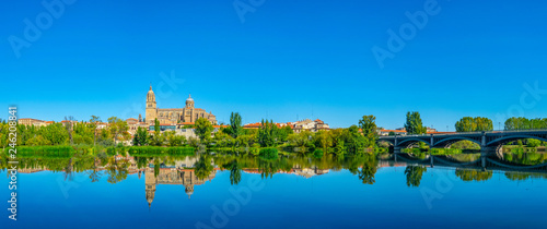 Cathedral at Salamanca reflected on river Tormes, Spain photo