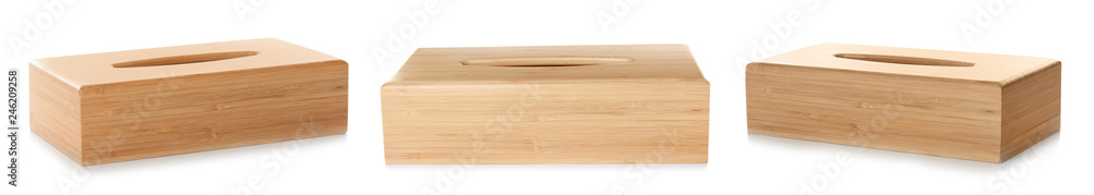 Fototapeta premium Set of modern empty wooden napkin holders on white background