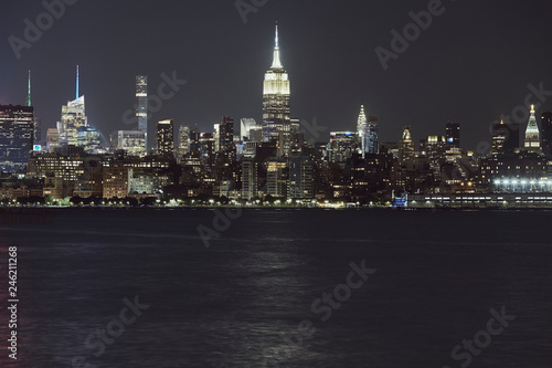 New York City skyline at night  color toning applied  USA.