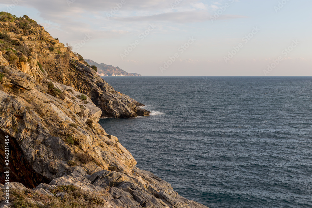 Seascape with steep slopes and the sea Seascape with steep slopes and the sea