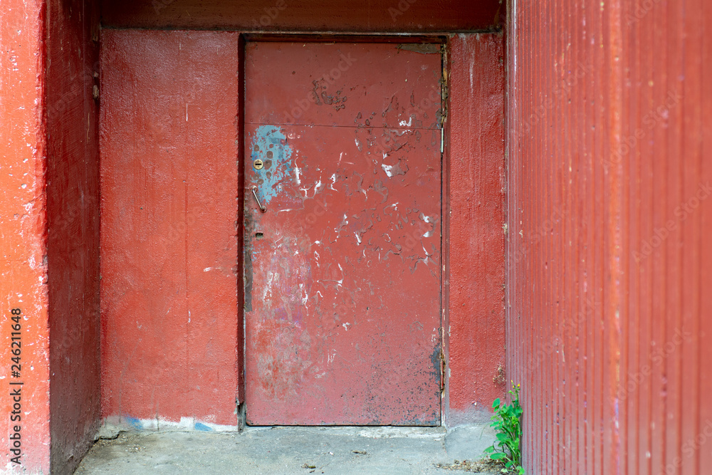 Old poor door of an East European apartment building Old poor door of an East European apartment building