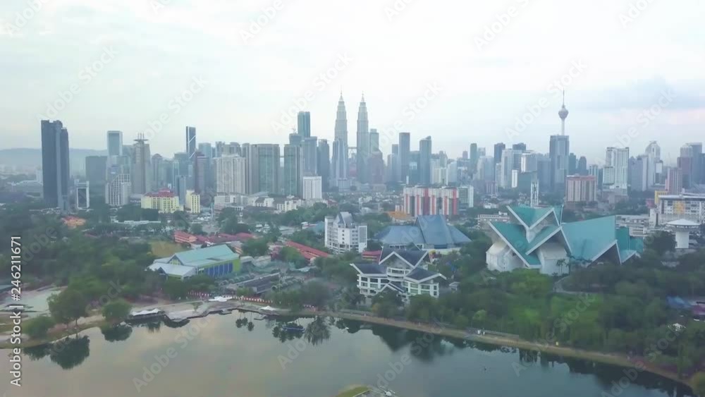 Beautiful Cityscape of Kuala Lumpur in Malaysia from Titiwangsa Lake Gardens - Aerial - Dolly Back Beautiful Cityscape of Kuala Lumpur in Malaysia from Titiwangsa Lake Gardens - Aerial - Dolly Back