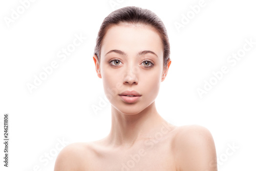 closeup portrait of young woman with clean fresh skin