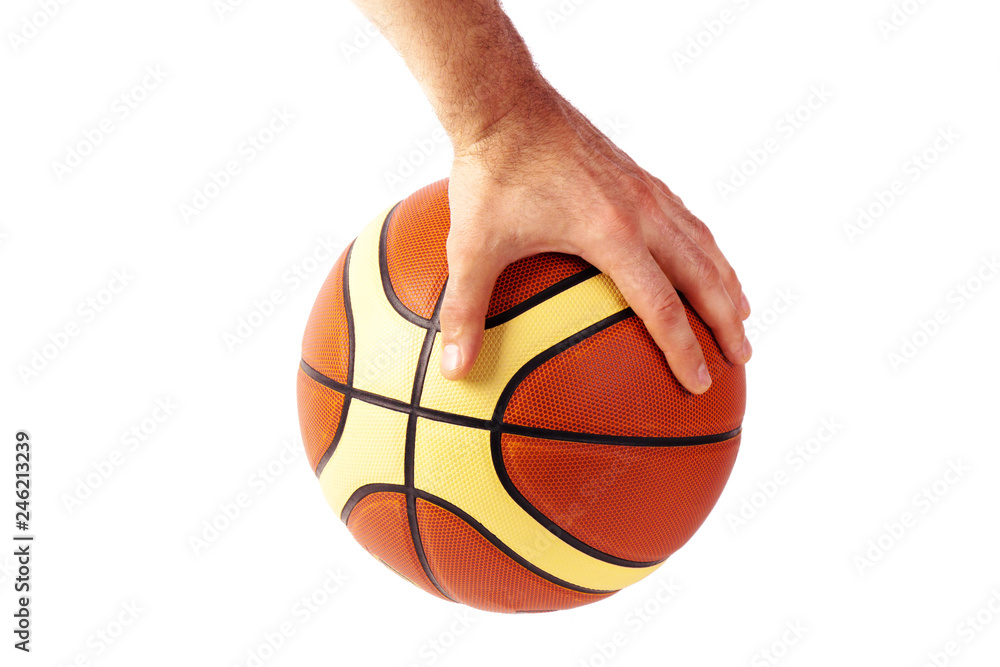 Hand holds basketball ball isolated on white background Hand holds basketball ball isolated on white background